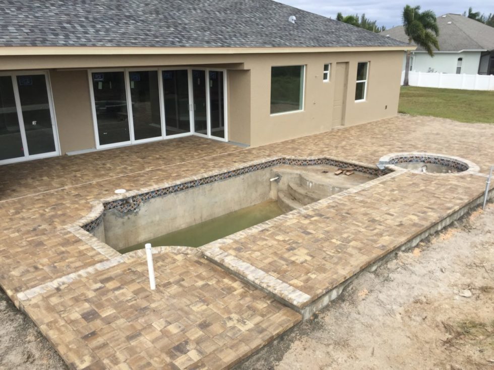 new home construction with pool